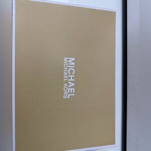 Michael Kors White Logo on Gold Framed Wall Art